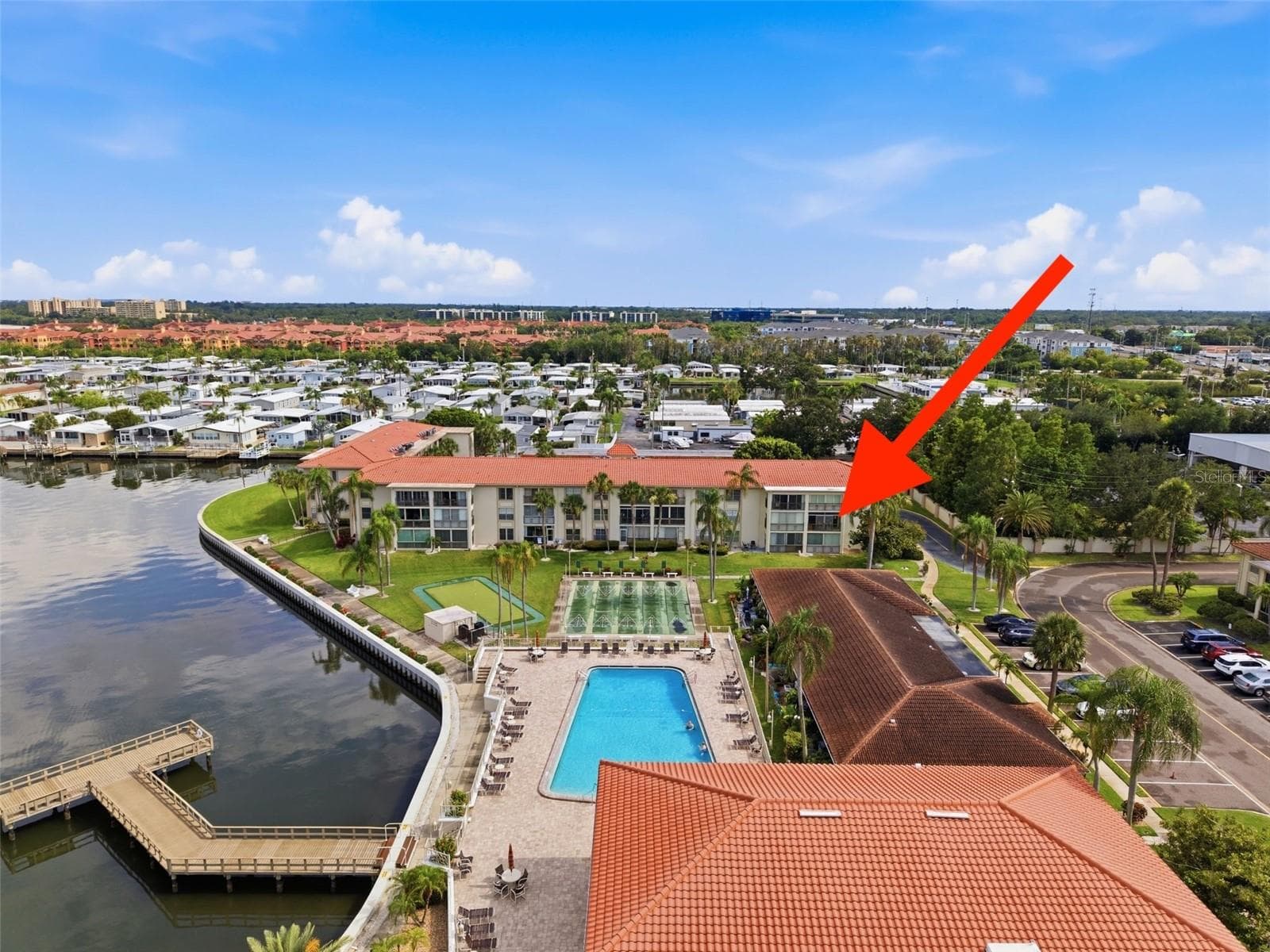 View of all the amenities and Old Tampa Bay from your Florida Room. - 19029 US HIGHWAY 19 N #7-12, CLEARWATER