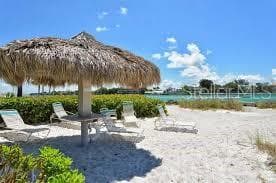 Private Beach w/ tiki's and lounge chairs - 100 SANDS POINT RD #303, LONGBOAT KEY