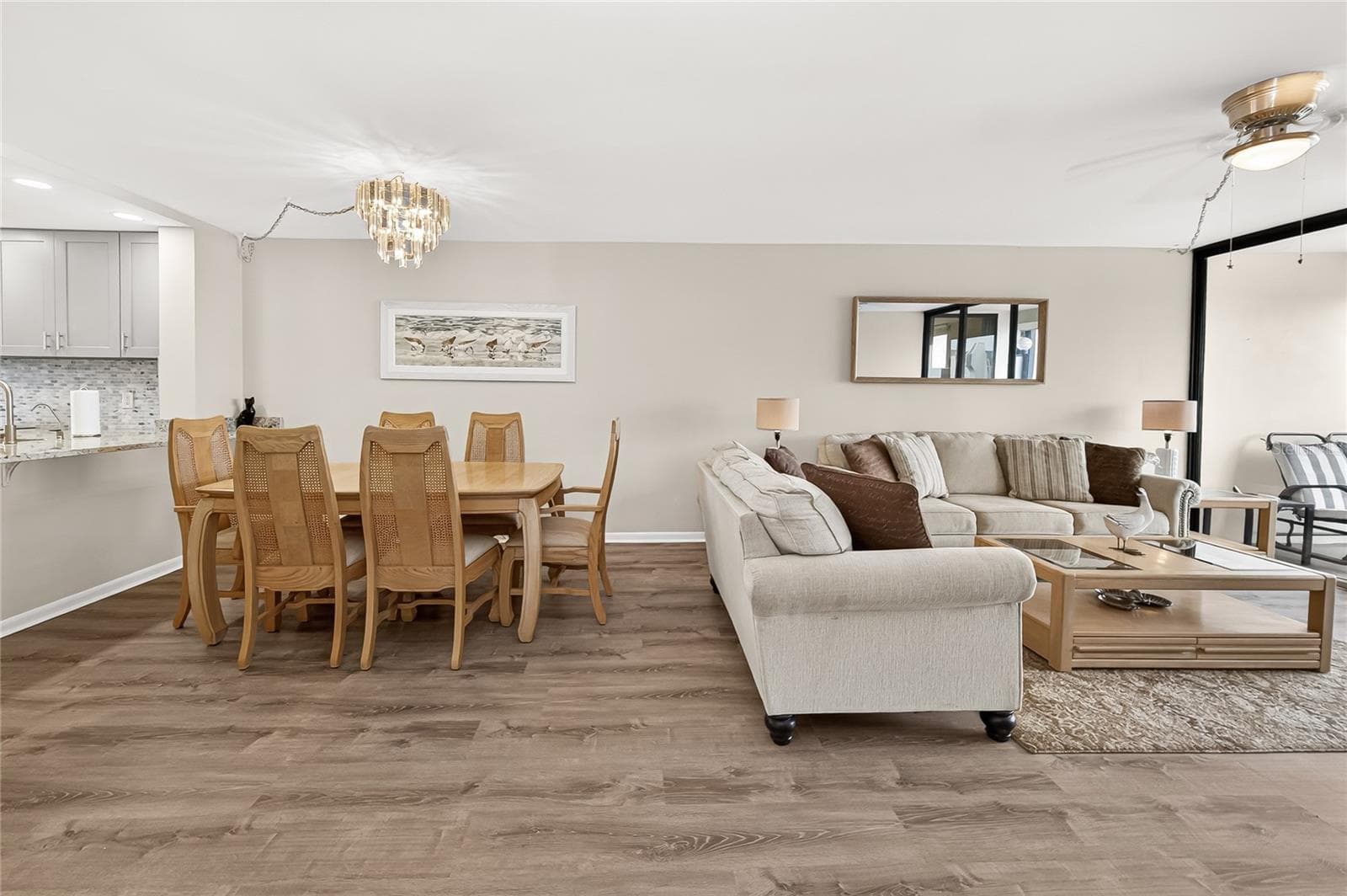 Dining area and living room have lots of natural light too! - 9425 BLIND PASS RD #1103, ST PETE BEACH