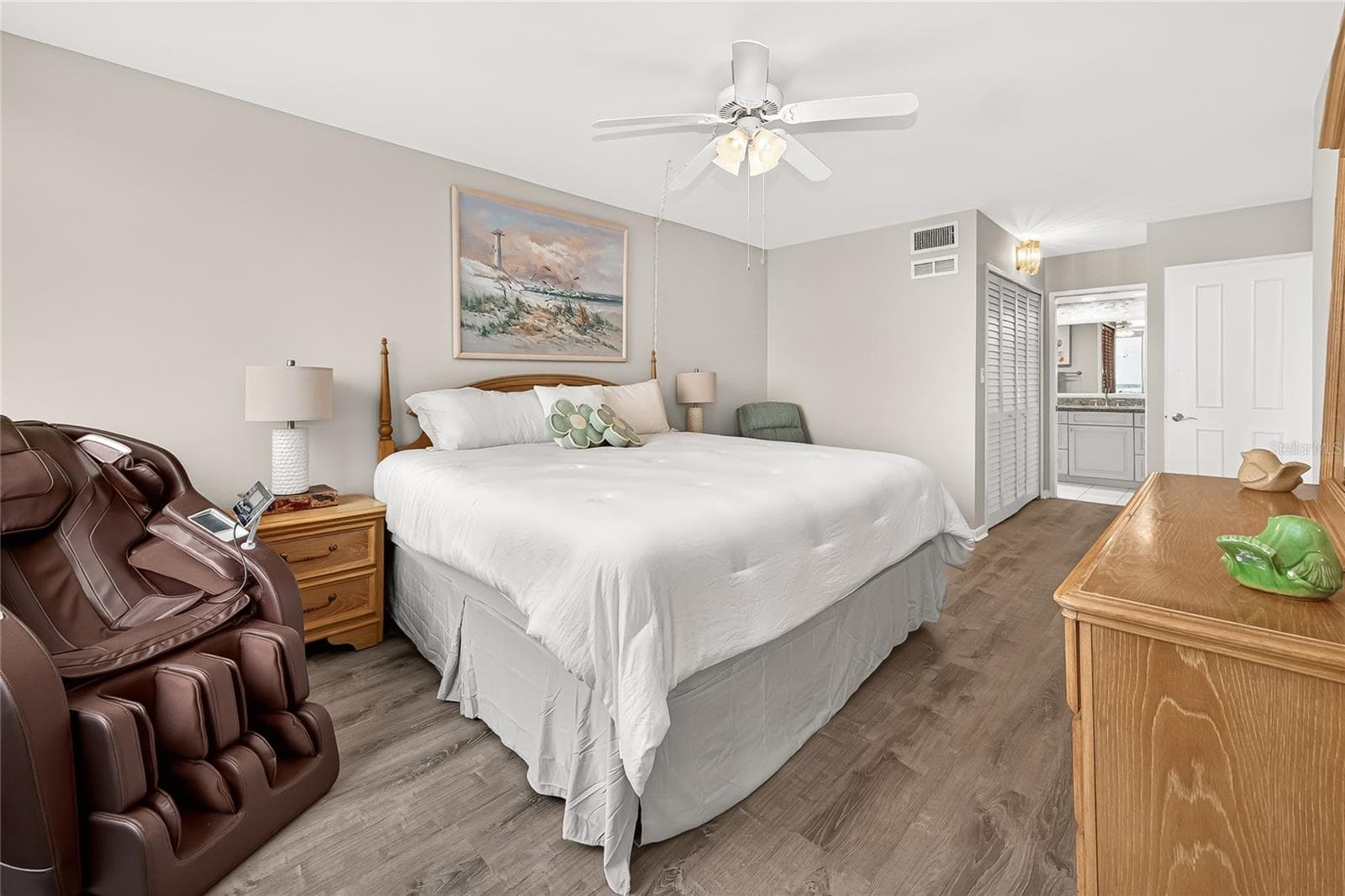 This primary bedroom has a large walk in closet - 9425 BLIND PASS RD #1103, ST PETE BEACH