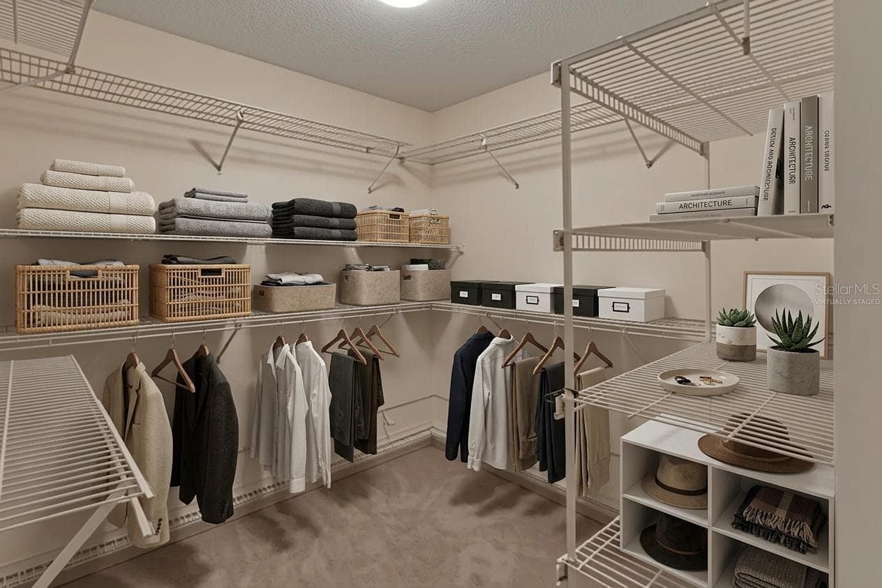 Virtually Staged Primary Closet - 2465 ROYAL RD, DELAND
