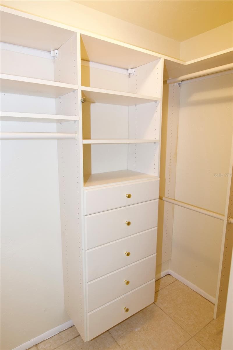Primary Bedroom Walk-in Closet - 625 WHITE PINE TREE RD #23, VENICE