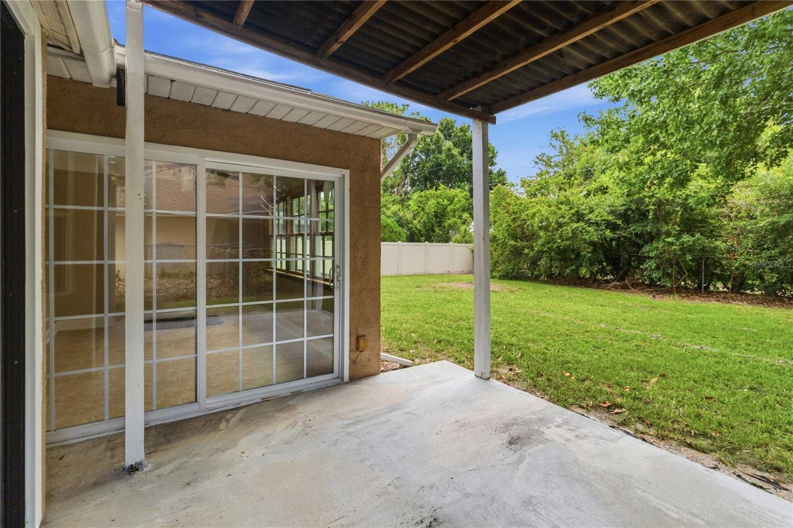 Covered back patio - 1564 CYPRESS WOODS CIR, ST CLOUD