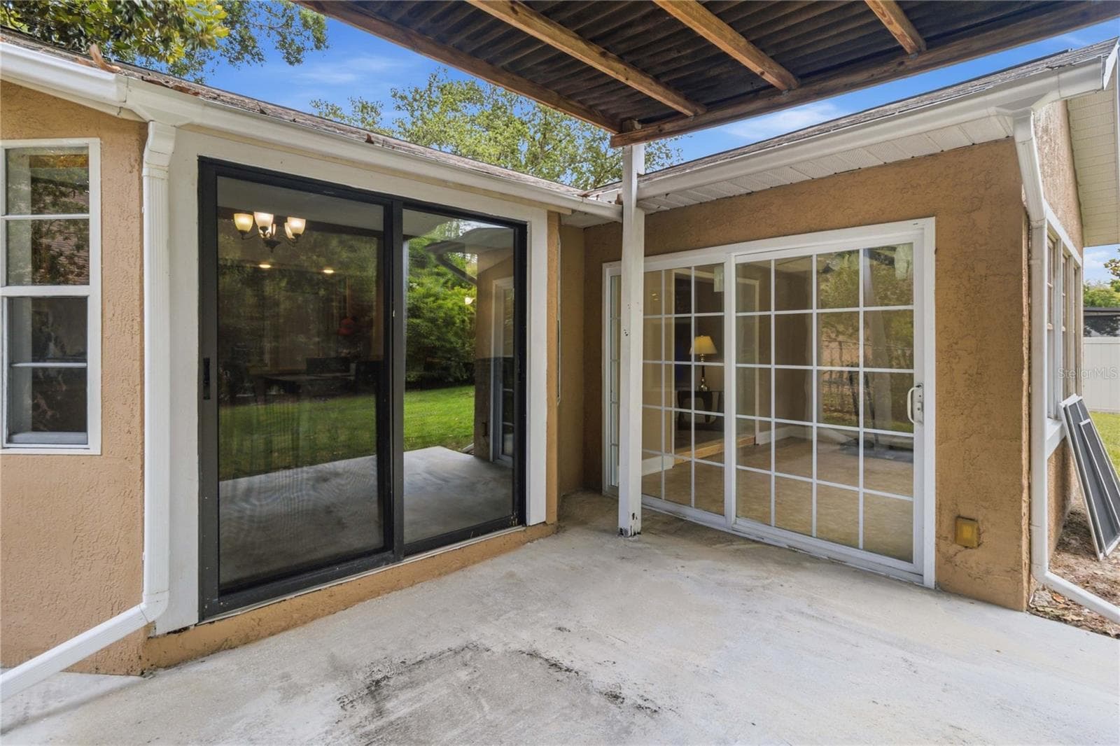 Two sets of sliding doors to patio - 1564 CYPRESS WOODS CIR, ST CLOUD