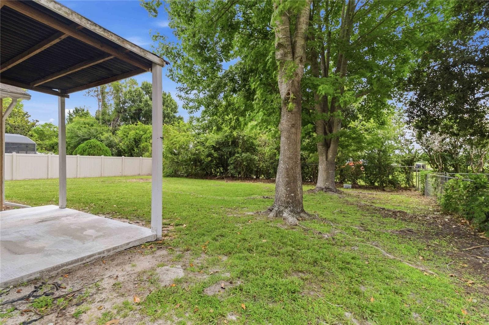 Fenced backyard - 1564 CYPRESS WOODS CIR, ST CLOUD
