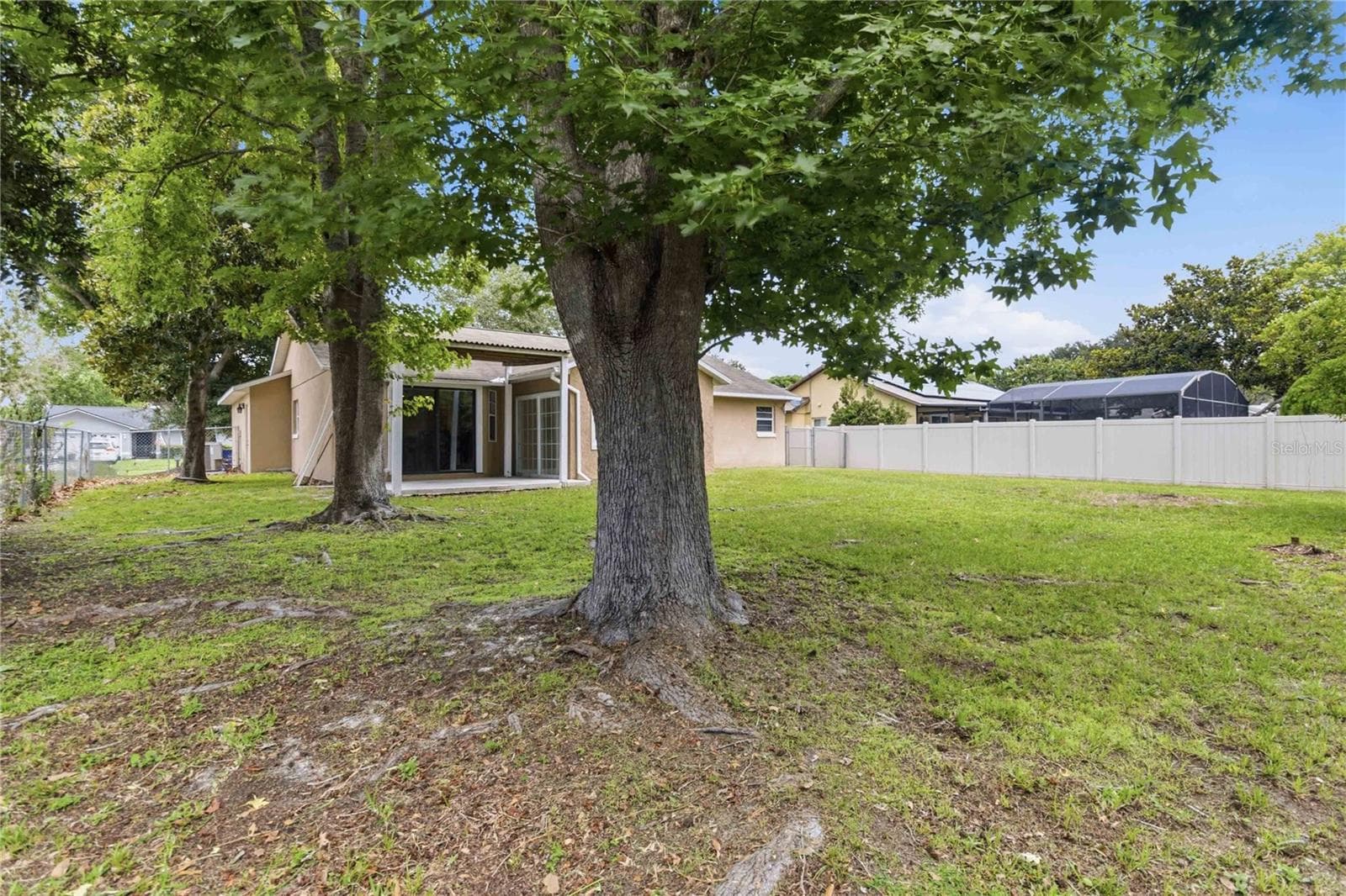 Enjoy plenty of shade under mature oak trees - 1564 CYPRESS WOODS CIR, ST CLOUD