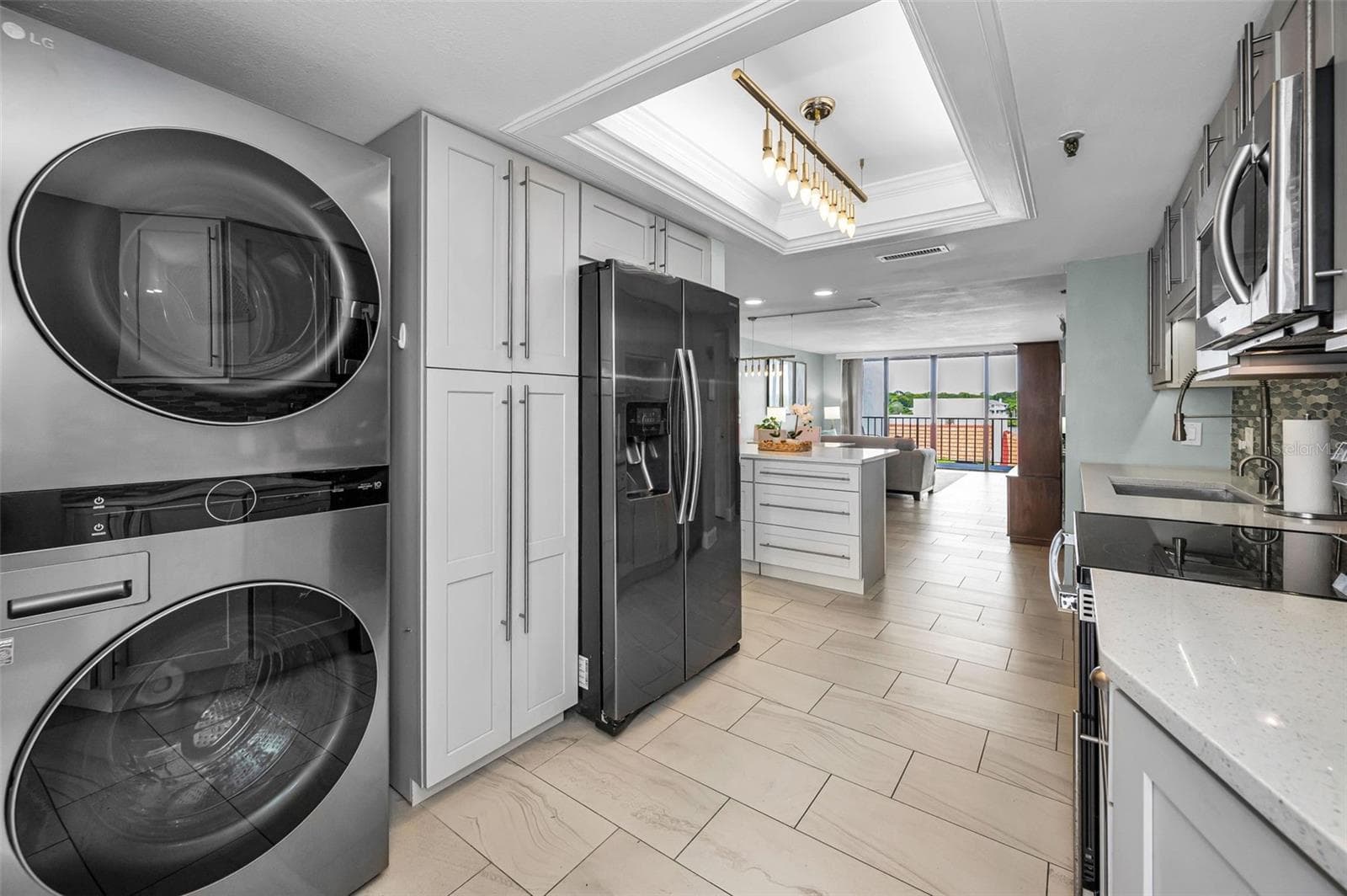 Inside stack washer & dryer - 19111 VISTA BAY DR #304, INDIAN SHORES