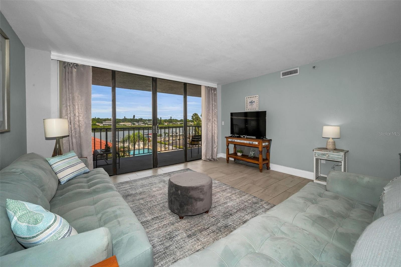 Living area with the balcony steps away - 19111 VISTA BAY DR #304, INDIAN SHORES