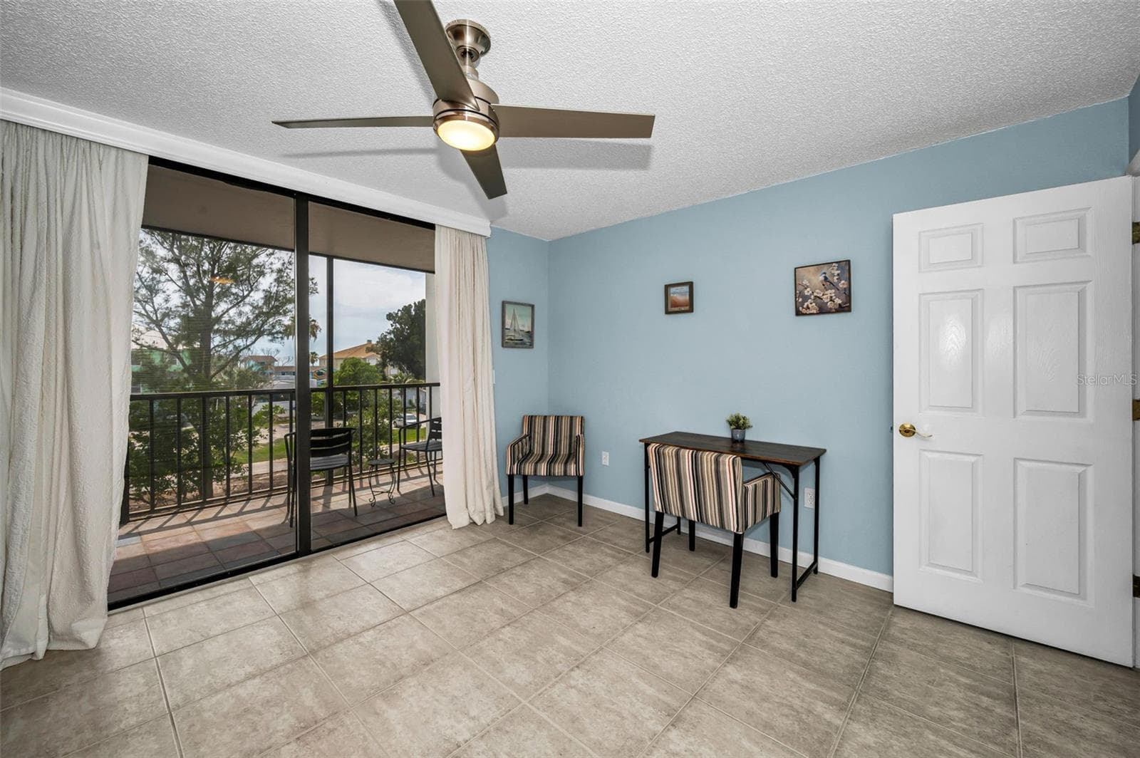Second bedroom with your own private west facing balcony to enjoy the sunsets! - 19111 VISTA BAY DR #304, INDIAN SHORES