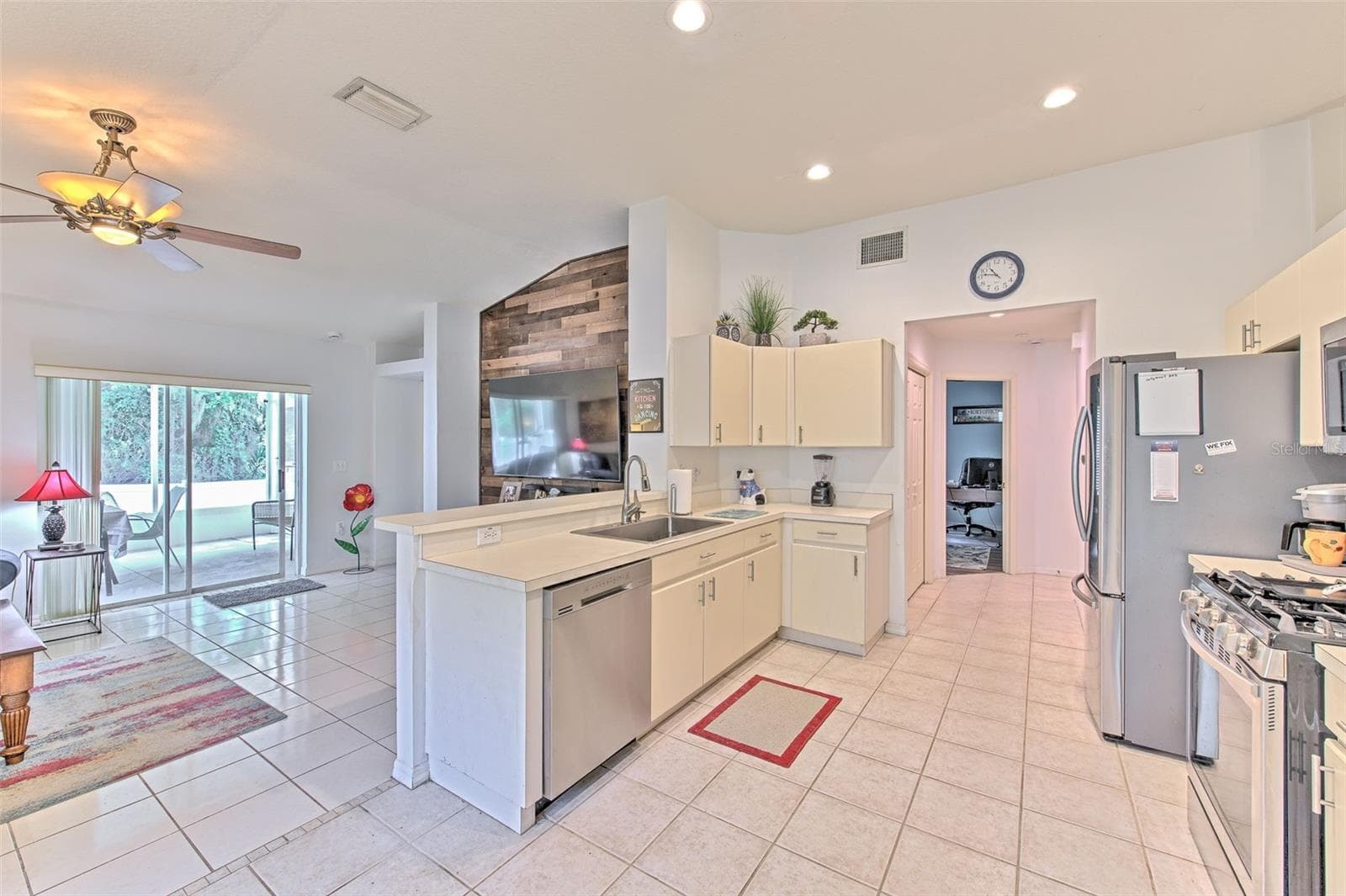 Looking towards kitchen and secondary bedroom - 30914 BURLEIGH DR, WESLEY CHAPEL