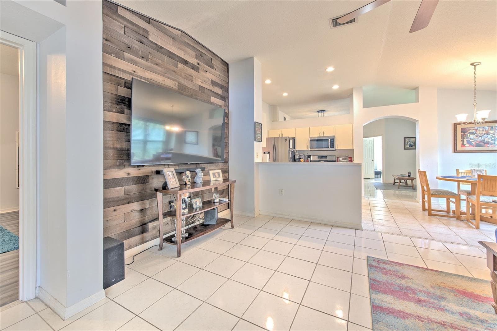 Beautiful wood looking wall for TV in Family room - 30914 BURLEIGH DR, WESLEY CHAPEL