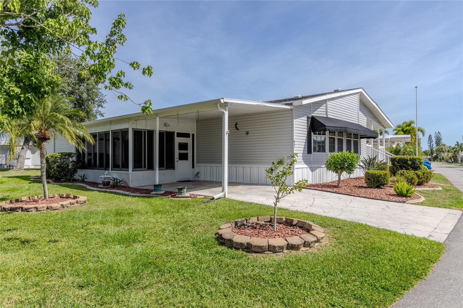 Manufactured Home at 2100 KINGS HWY #63, PORT CHARLOTTE, photo 2 of 81