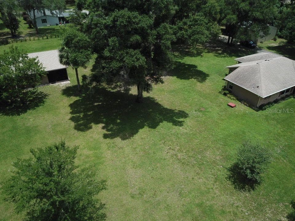 Drone shot of home with detached garge - 267 N ORANGE AVE, LAKE HELEN