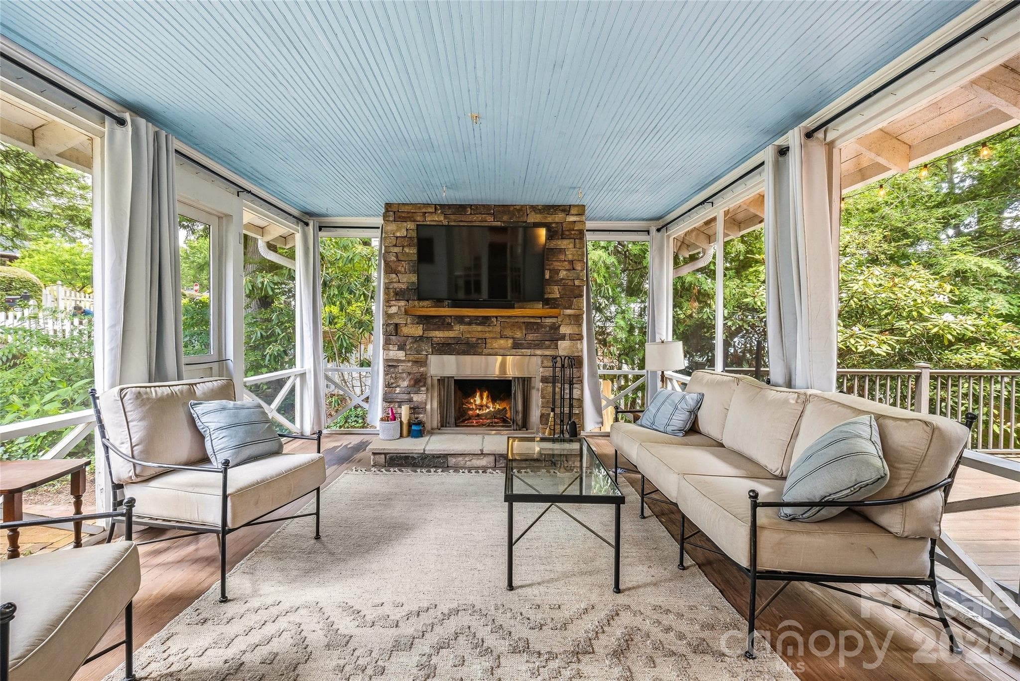 Screen porch with wood burning fireplace - Hendersonville