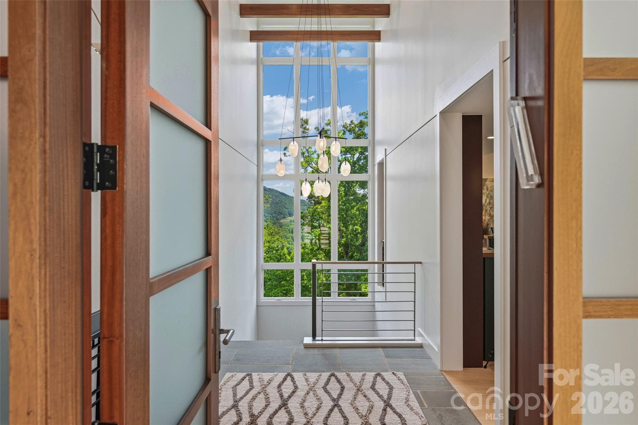 A welcoming introduction to the home's sophisticated modern design - 1121 Timberbluff Way, Arden