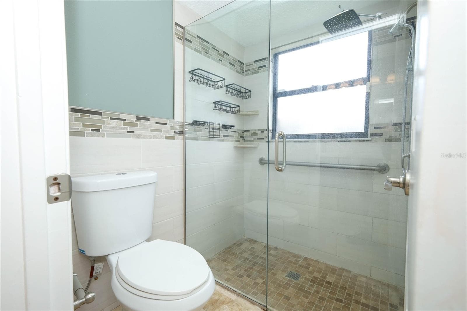 Primary bathroom shower. - 9110 PALM TREE DR, WINDERMERE