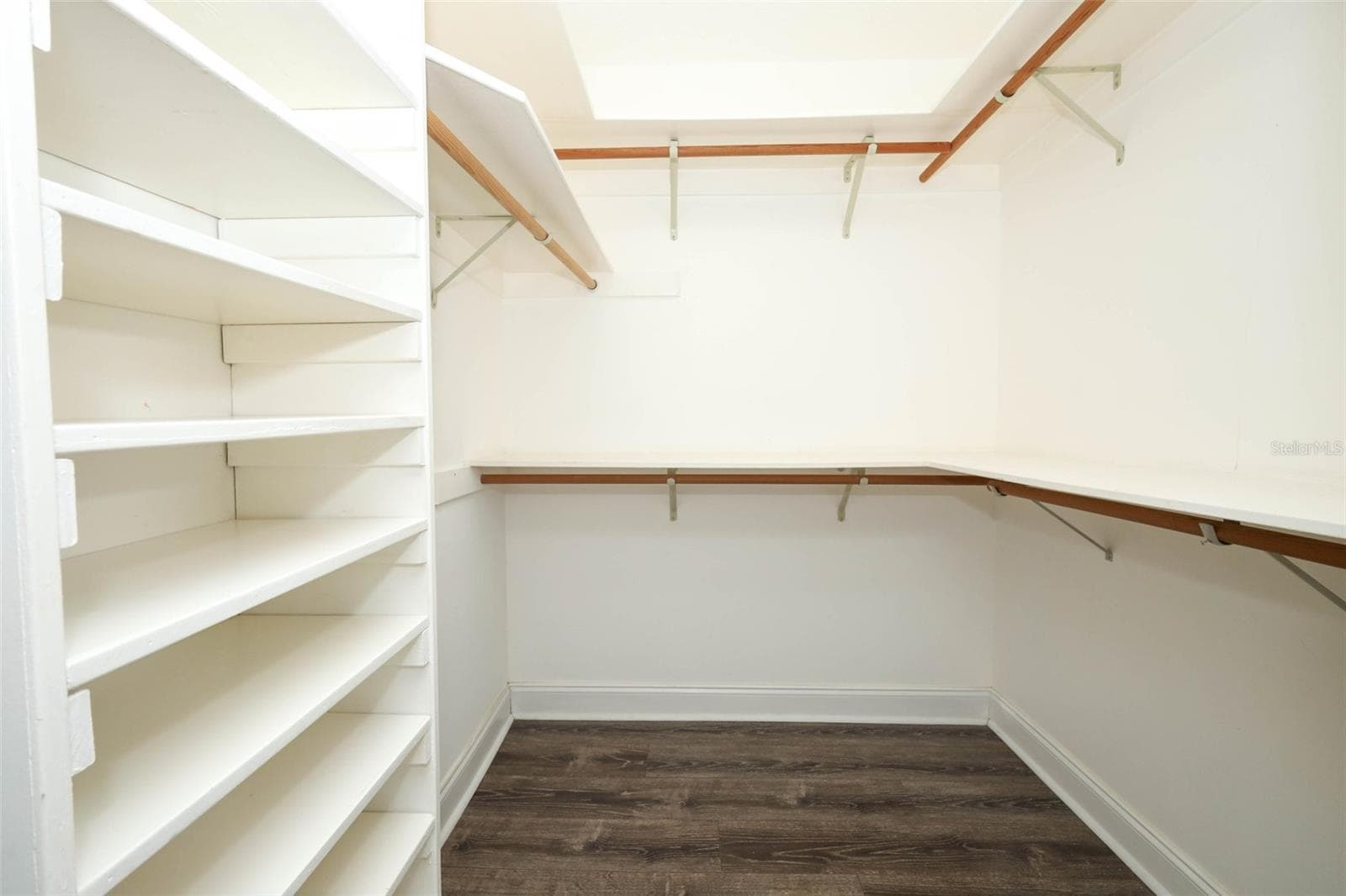 Primary bathroom walk-in closet. - 9110 PALM TREE DR, WINDERMERE
