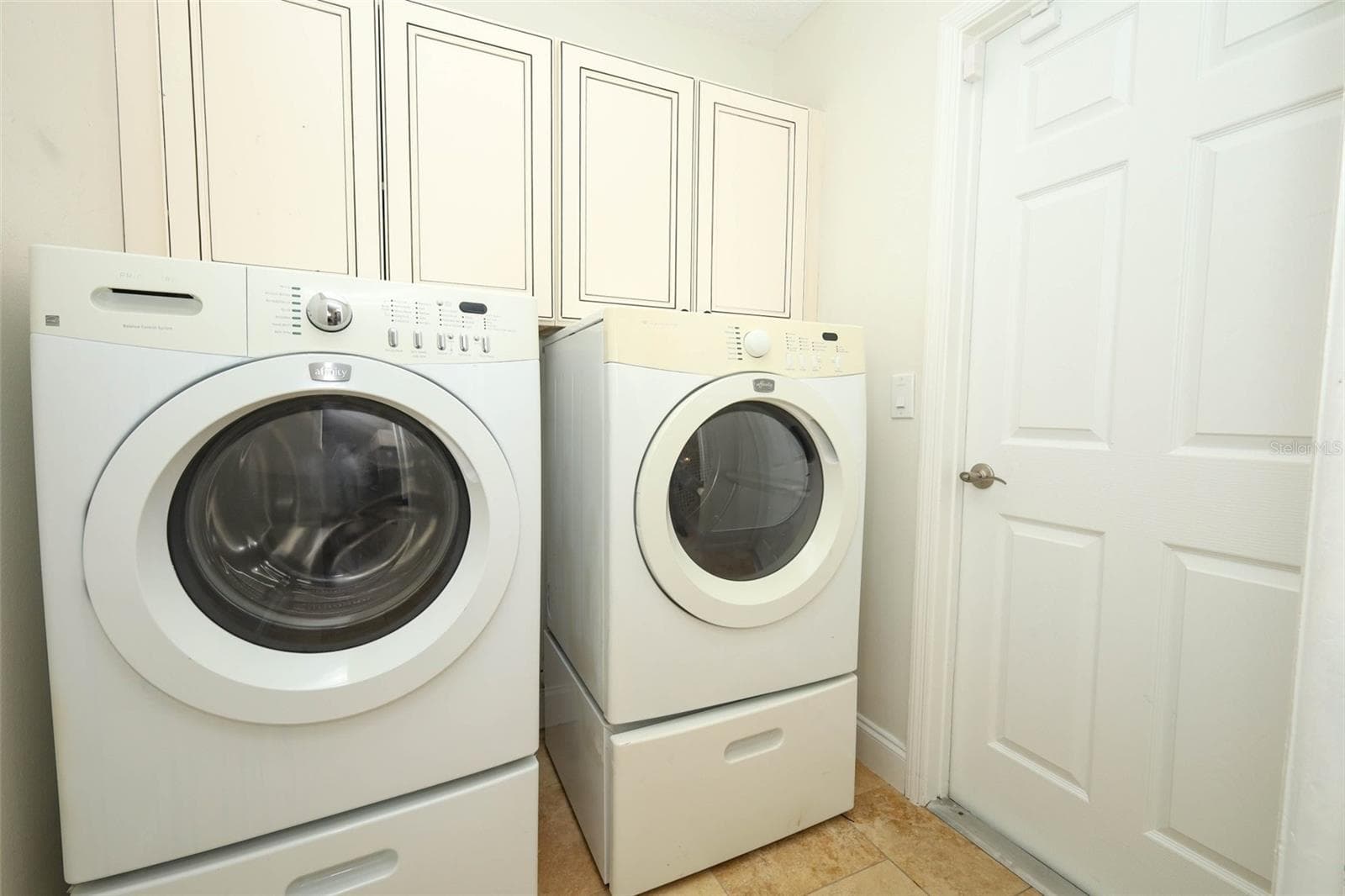 Inside laundry room. - 9110 PALM TREE DR, WINDERMERE