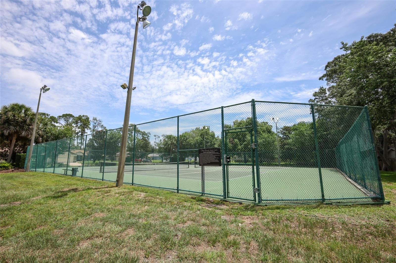Community tennis courts. - 9110 PALM TREE DR, WINDERMERE