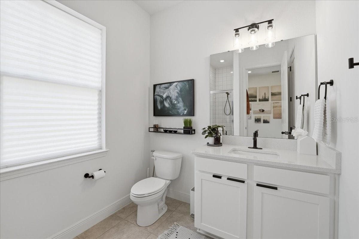 FULL bath with deep shower enclosure and storage closet - 9741 NERUDA ST, ORLANDO