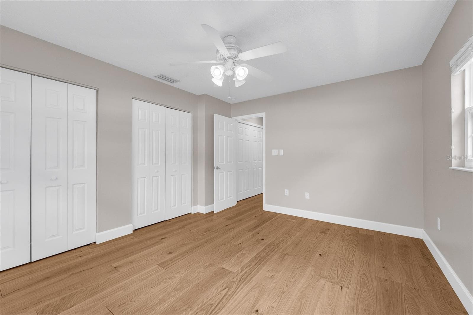 2nd Bedroom with double closets - 110 N TREMAIN ST #209, MOUNT DORA