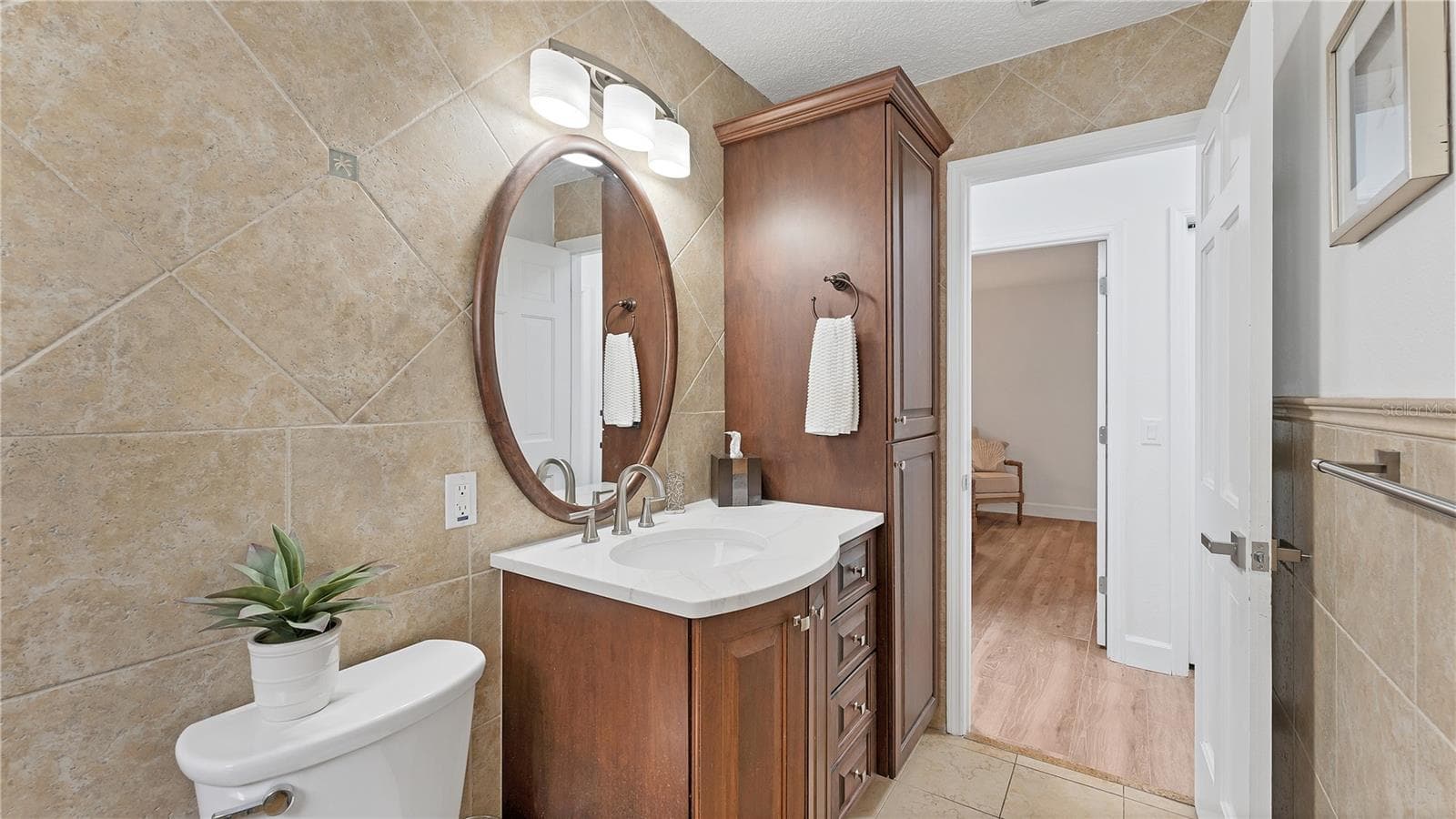 First floor guest full bathroom - 5623 HULL CT, NEW PORT RICHEY