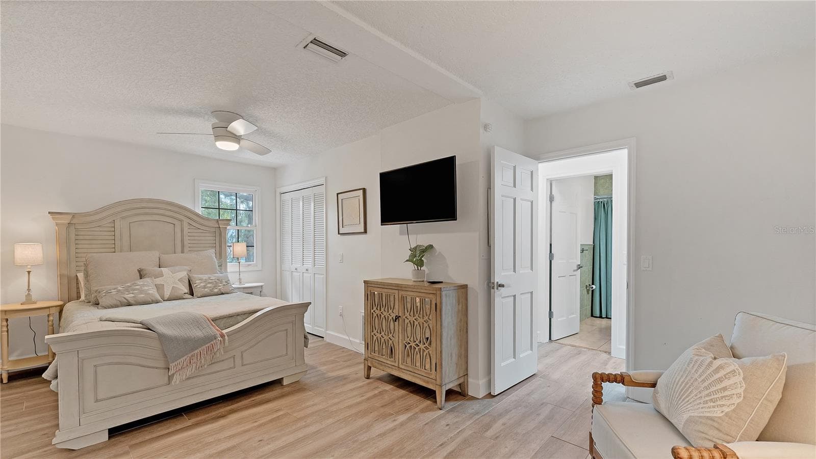First floor guest bedroom (previously staged) - 5623 HULL CT, NEW PORT RICHEY