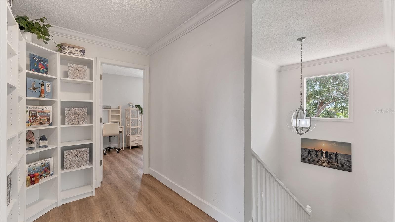 Upstairs landing looking to bedroom 3 with ensuite (previously staged) - 5623 HULL CT, NEW PORT RICHEY