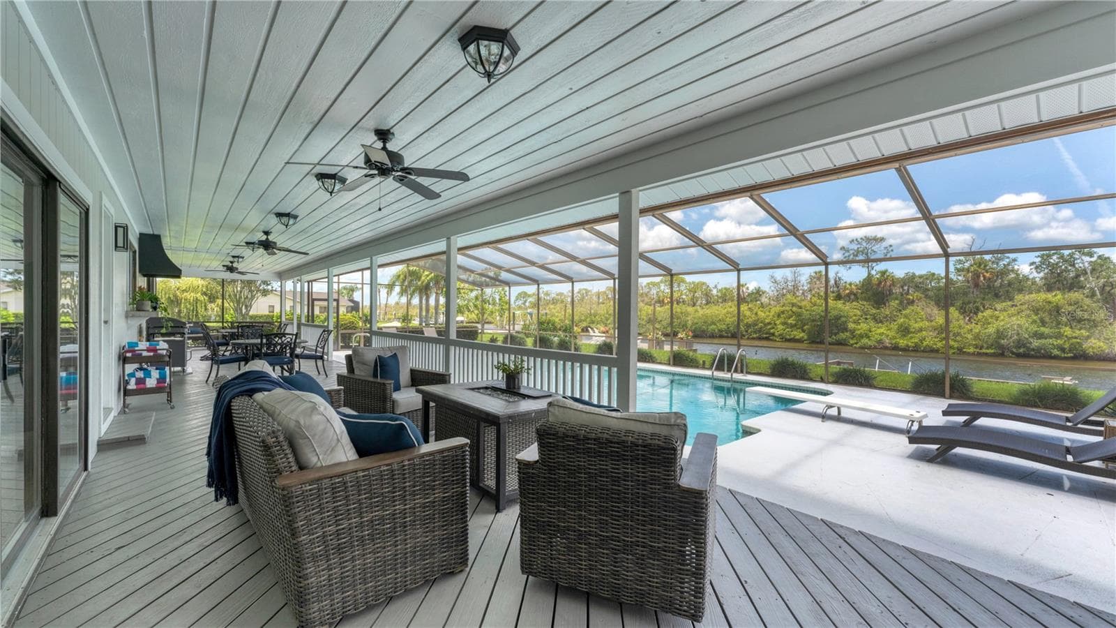 Outdoor covered porch area(previously staged) - 5623 HULL CT, NEW PORT RICHEY