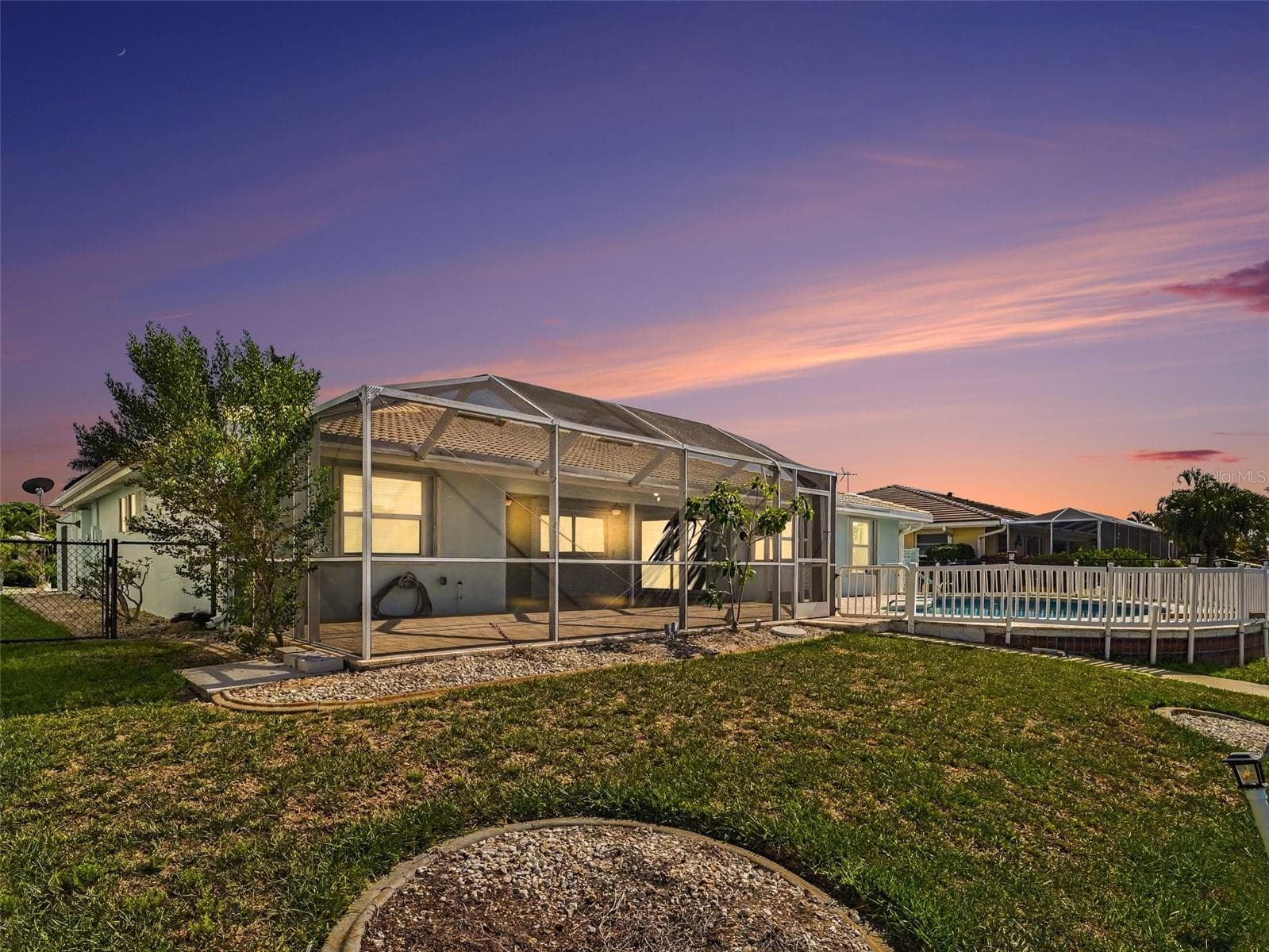 Enjoy the SWFL evenings with breathtaking sunsets (view from the water/canal) - 548 BELVEDERE CT, PUNTA GORDA