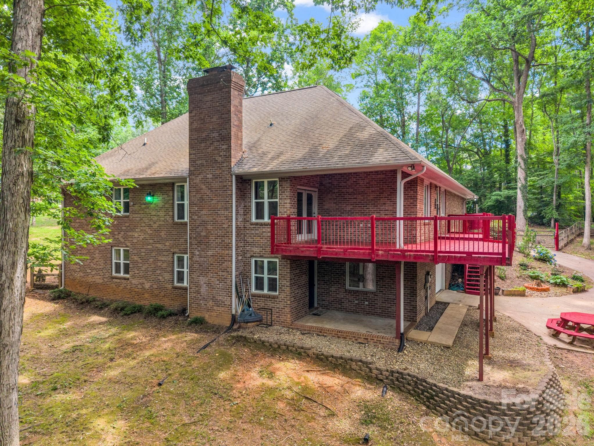 Covered deck overlooking backyard - Shelby