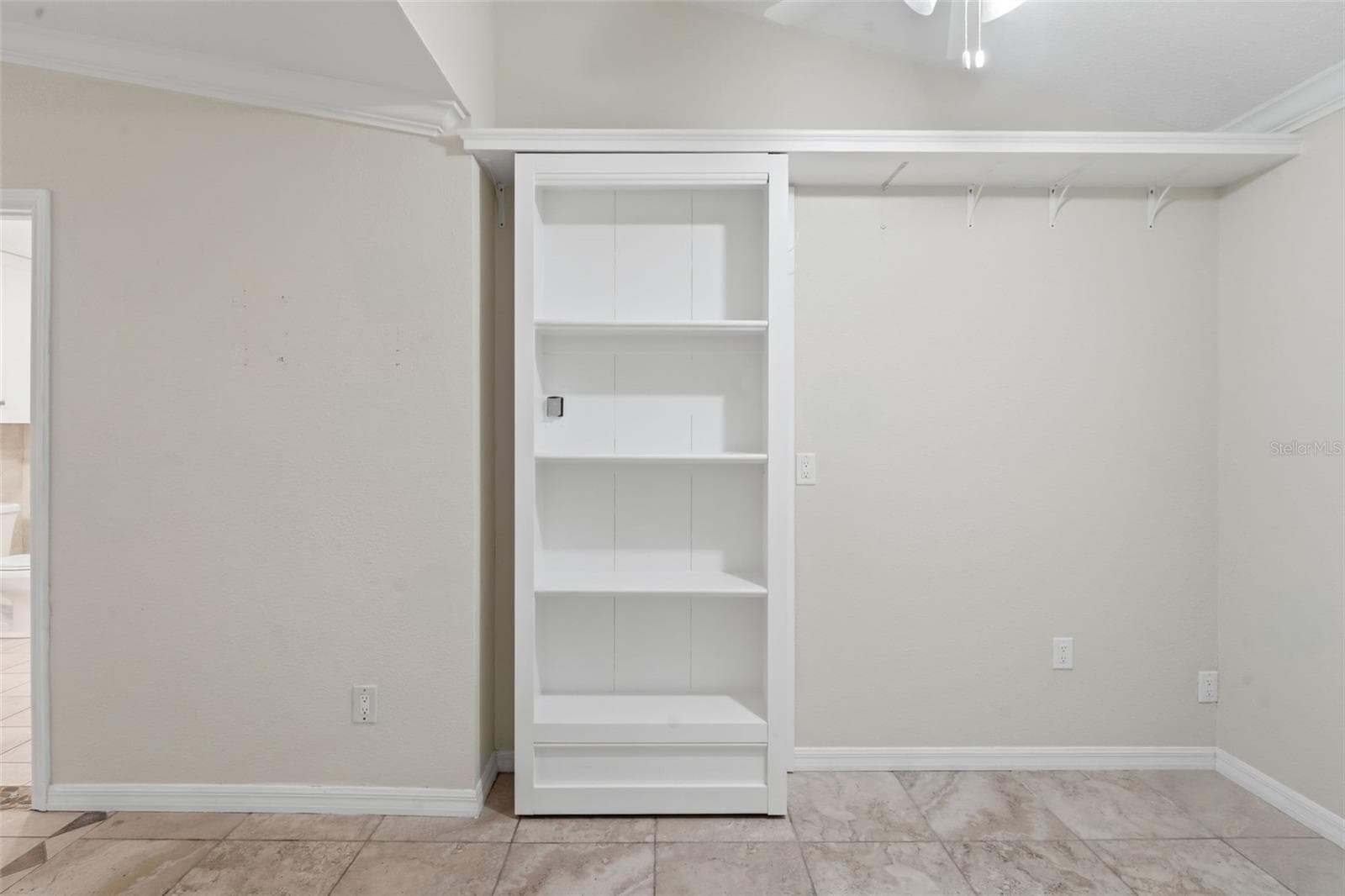 Shelf door to safe room - 8423 BERMUDA DUNES DR, ORLANDO