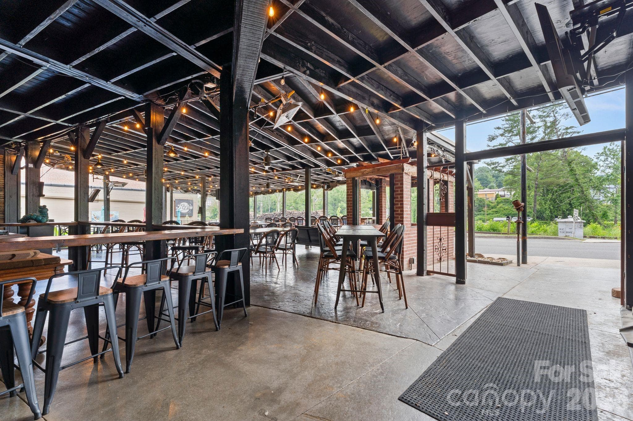 bottom level dining outside - 69 Locust Street, Spruce Pine