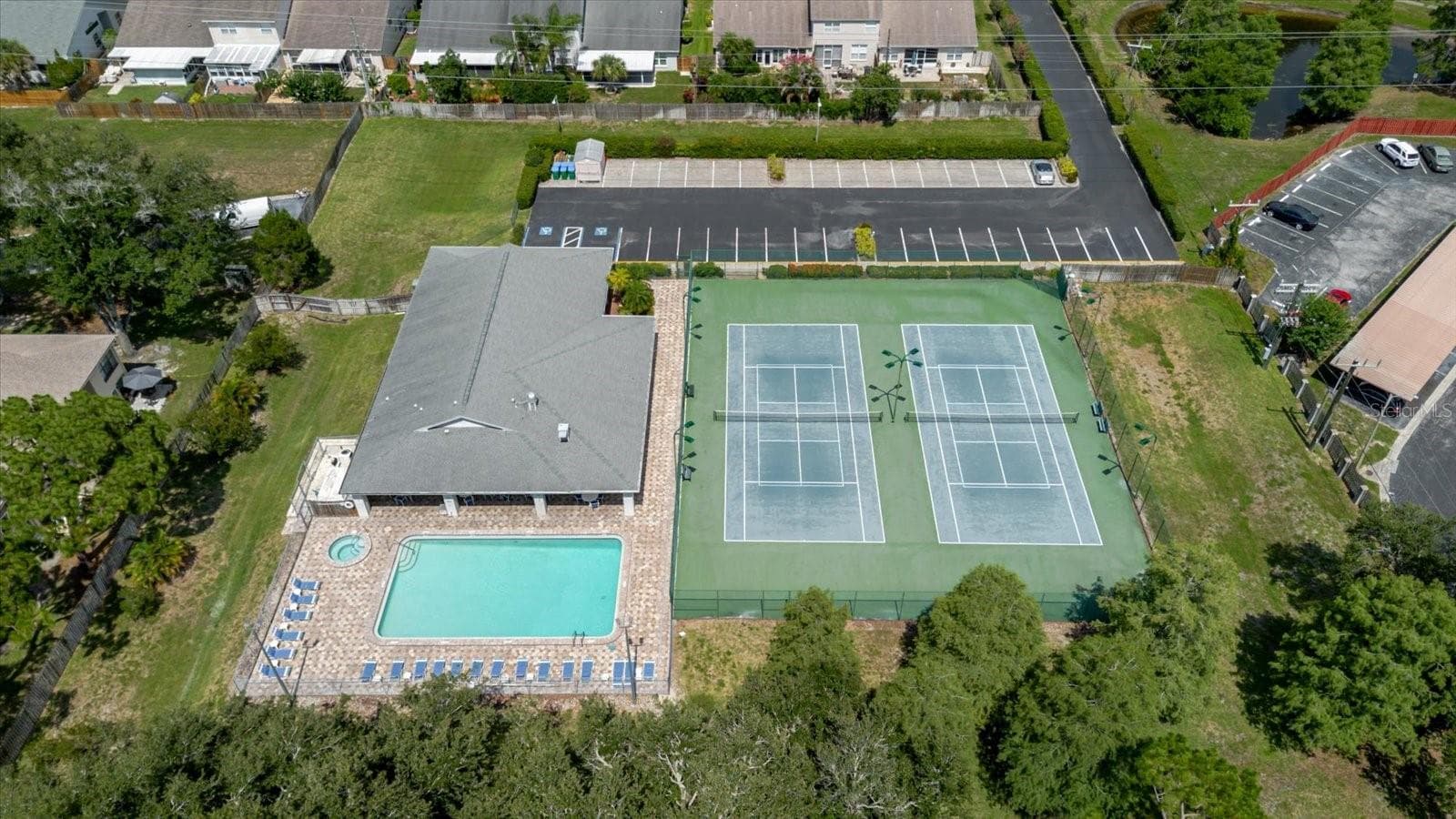 Main Community Pool with Pickleball/Tennis Courts and Clubhouse - 2976 FIELDBROOK PL, CLEARWATER