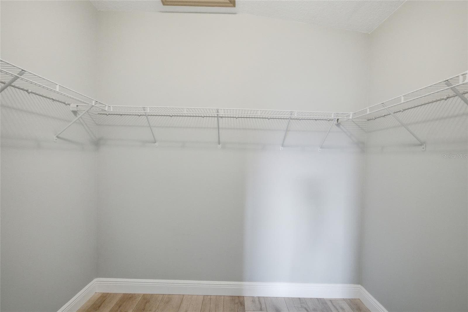 Primary walk in closet - 485 HARBOR RIDGE DR, PALM HARBOR