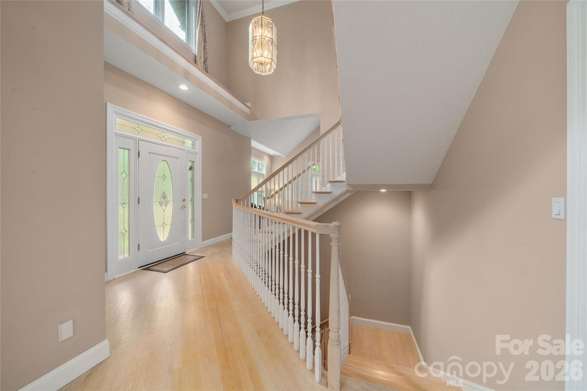 Foyer with hardwood floors - 136 Rumbling Bald Road, Lake Lure