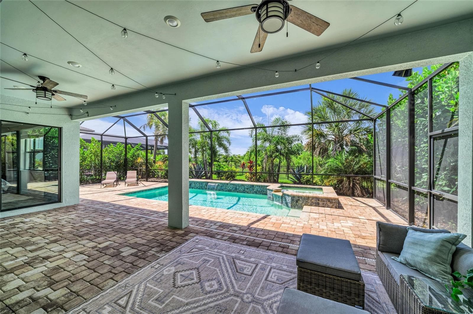 Ample covered lanai space with outdoor kitchen rough-in - 16438 SLATE PL, LAKEWOOD RANCH