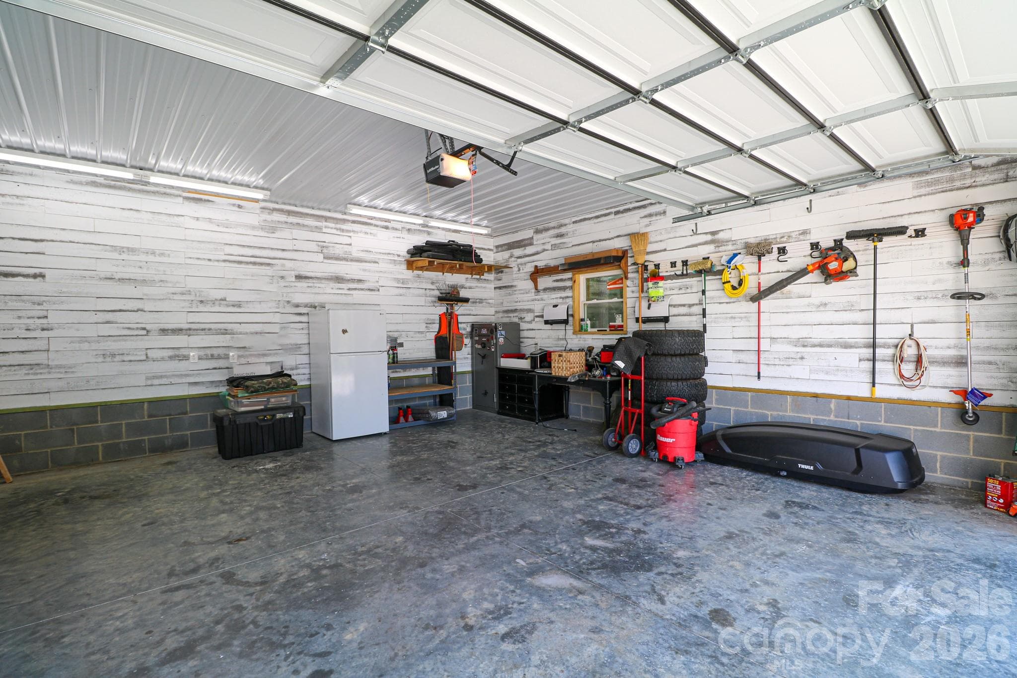 Inside workshop with remote garage door. - 120 Wellington Drive, Salisbury
