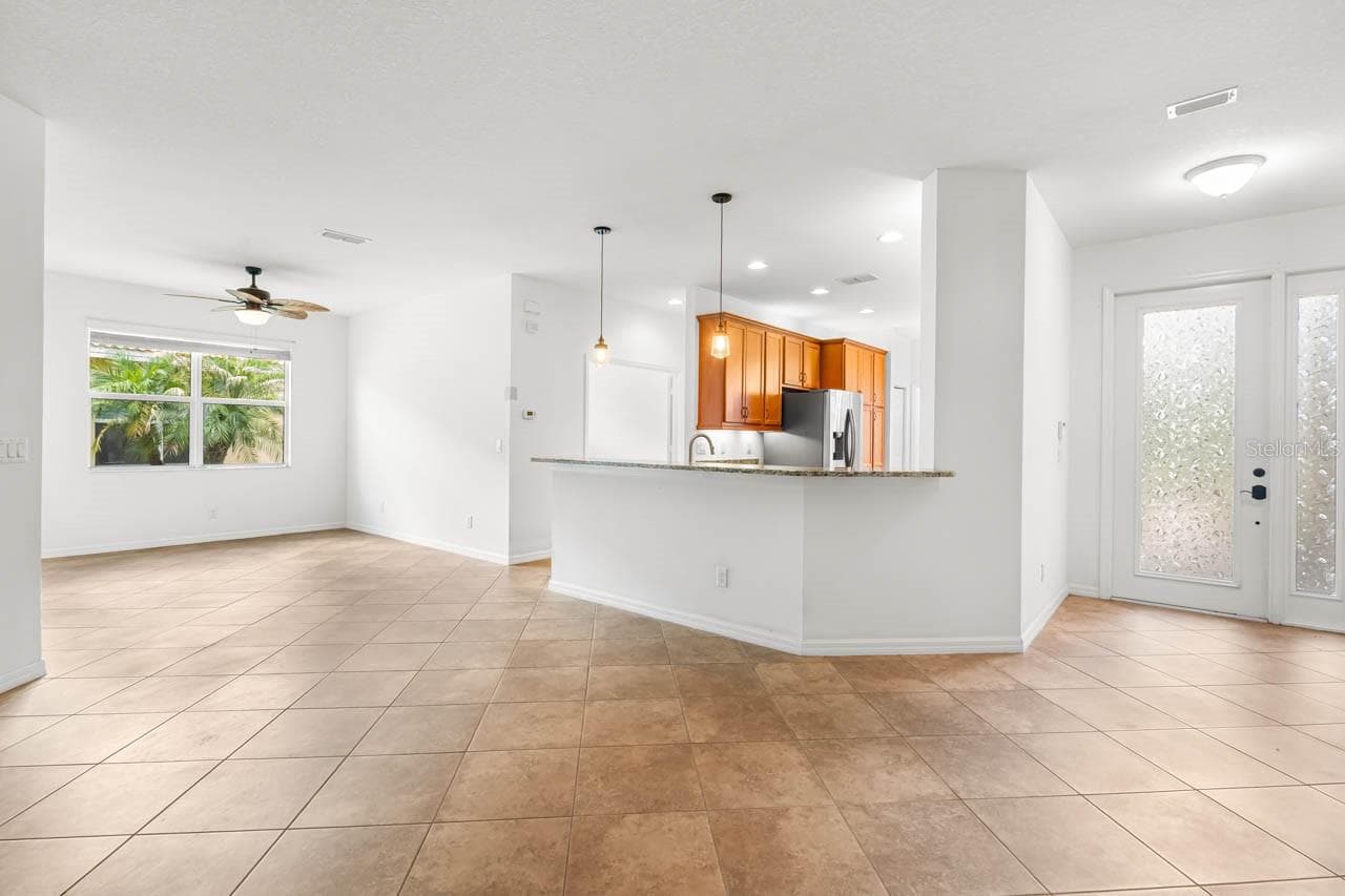 Dining Room and Kitchen - 15665 AURORA LAKE CIR, WIMAUMA
