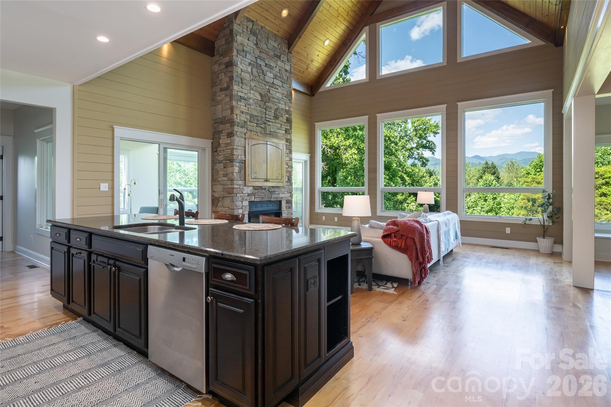 Seamless transition between the kitchen and sitting area, perfect for effortless entertaining and daily living. - 33 Bridle Path Drive, Barnardsville