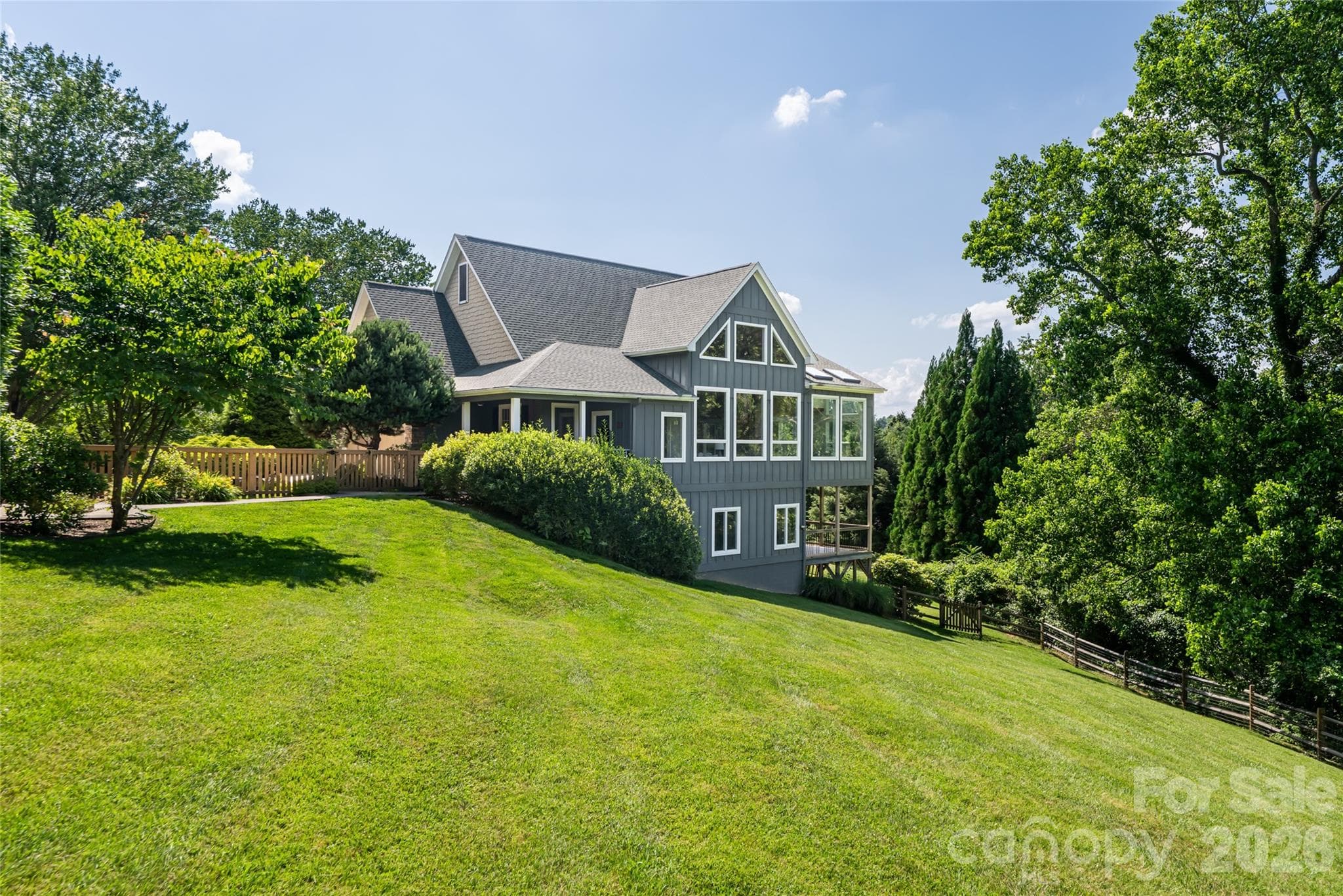 2.05 private acres creates a rare "micro-estate" feel with useable, partially fenced yard - 33 Bridle Path Drive, Barnardsville