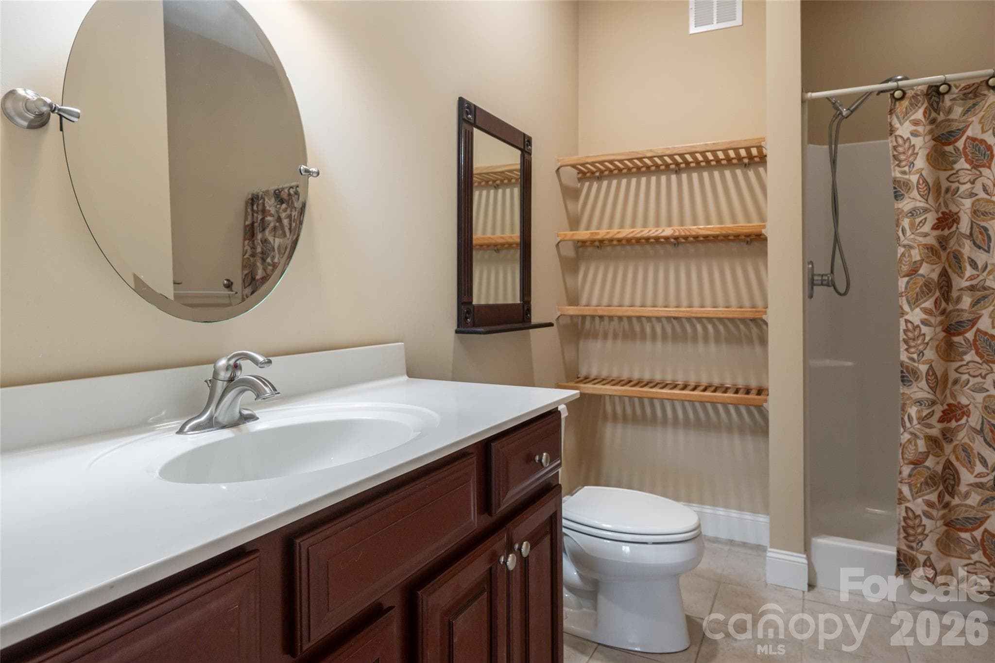 Lower level guest bathroom with walk in shower - 33 Bridle Path Drive, Barnardsville