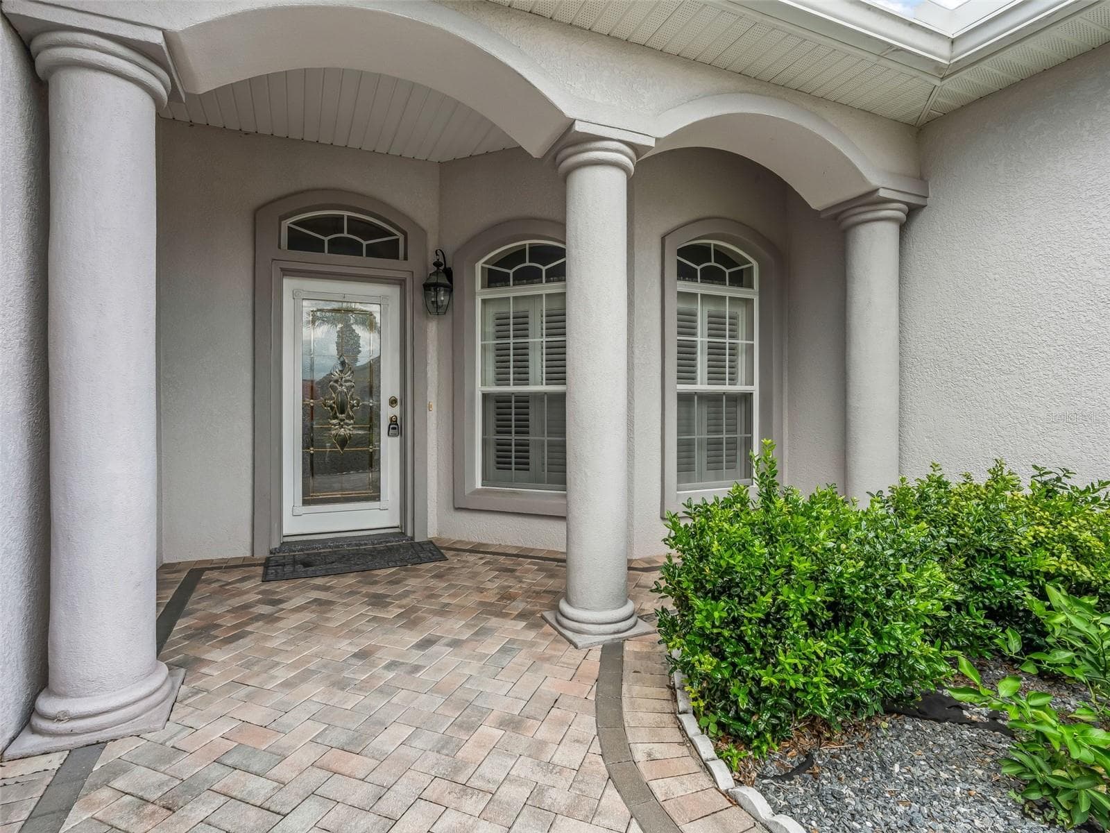 Elegant Front Entrance w/Leaded Glass Door & Storm Door - 16887 SE 110TH COURT RD, SUMMERFIELD