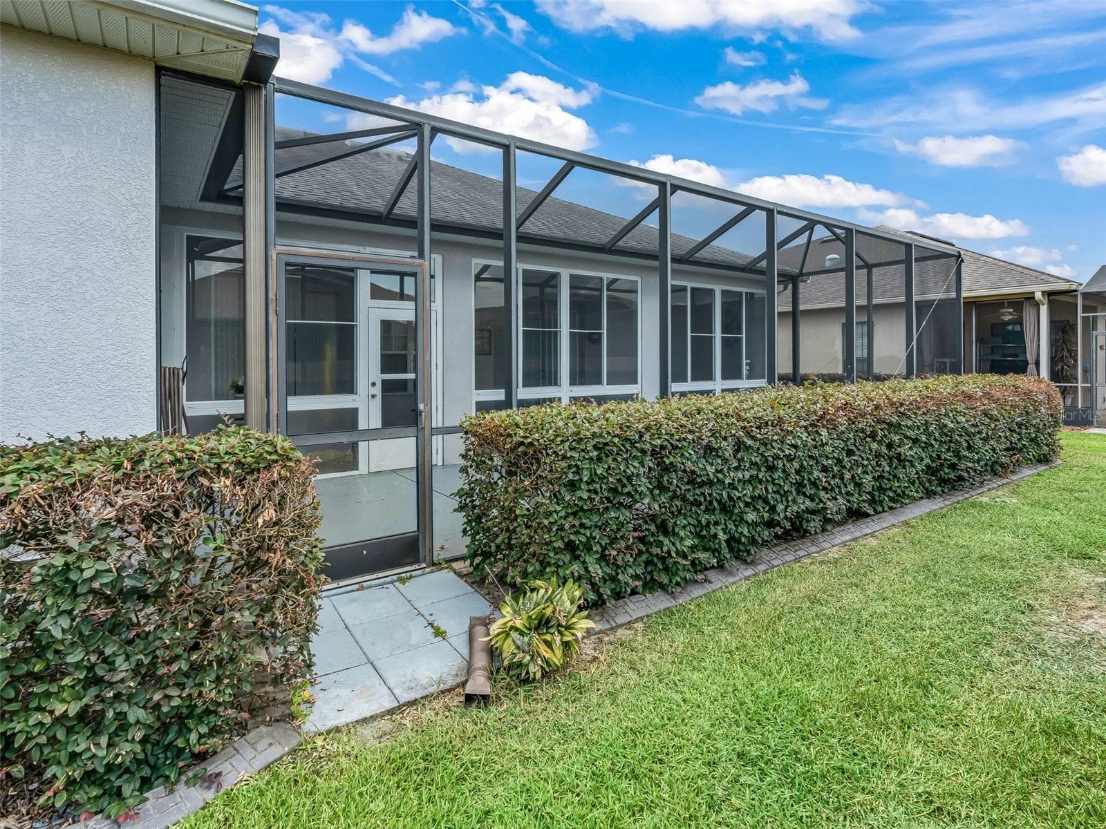 34 x 10 Birdcage Covered Back Patio - 16887 SE 110TH COURT RD, SUMMERFIELD