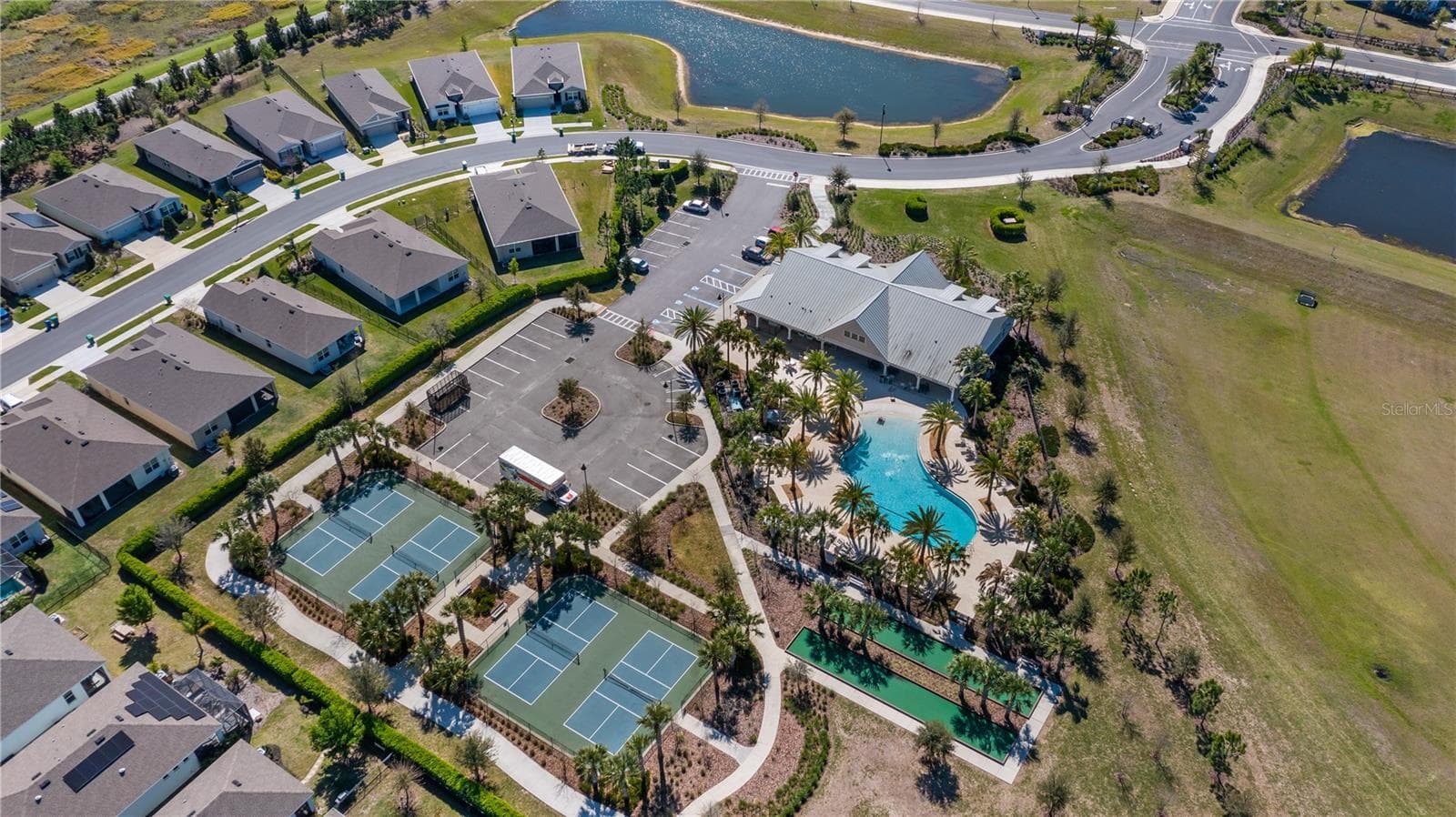 Community Amenities: Pool, Clubhouse, Fitness Center, Bocce Ball & Pickle ball courts. - 8033 PENROSE PL, WILDWOOD