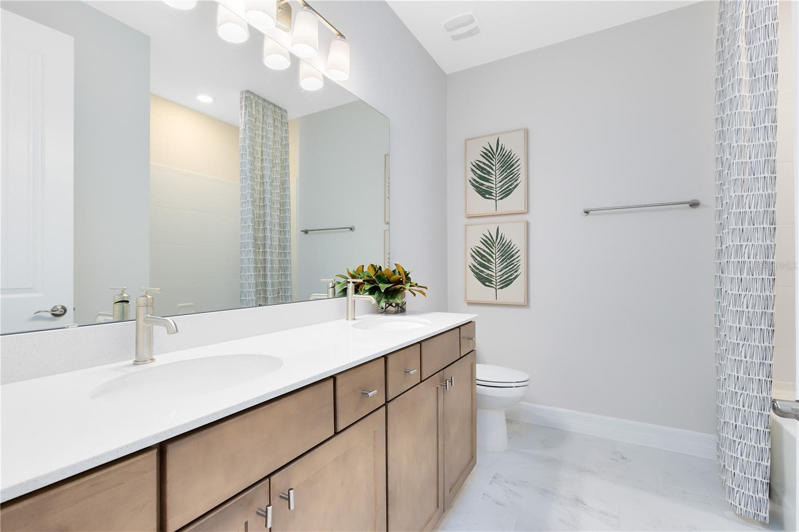 Model Home Design Only. Pictures and furnishings are for illustrative purposes only. Elevations, colors and options may vary. Furniture is for model home staging only. - 5237 HANDSOME HILLS DRIVE, MOUNT DORA