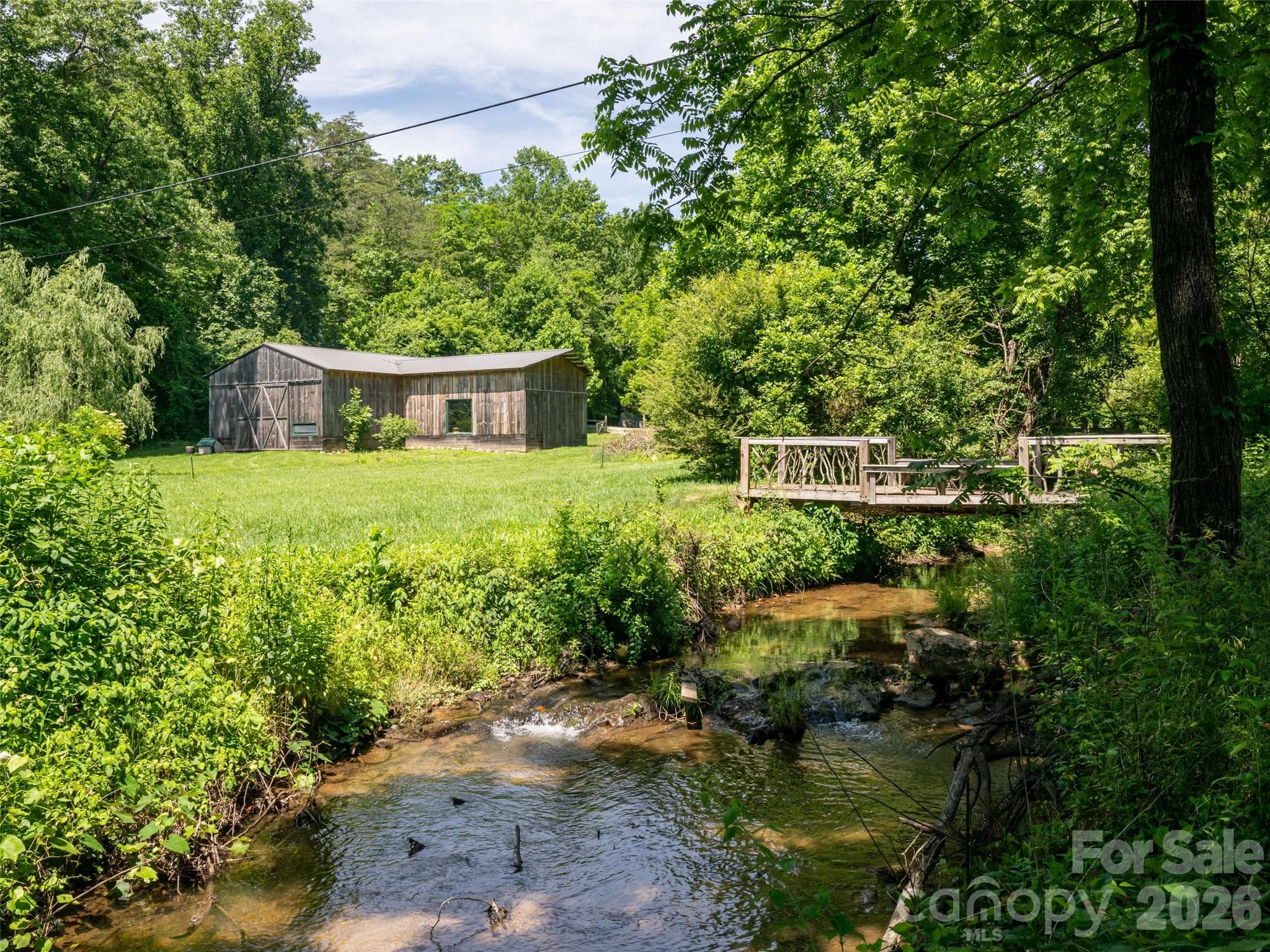 Avery Creek, walking bridge, and Larger Barn - 508 Avery Creek Road, Arden