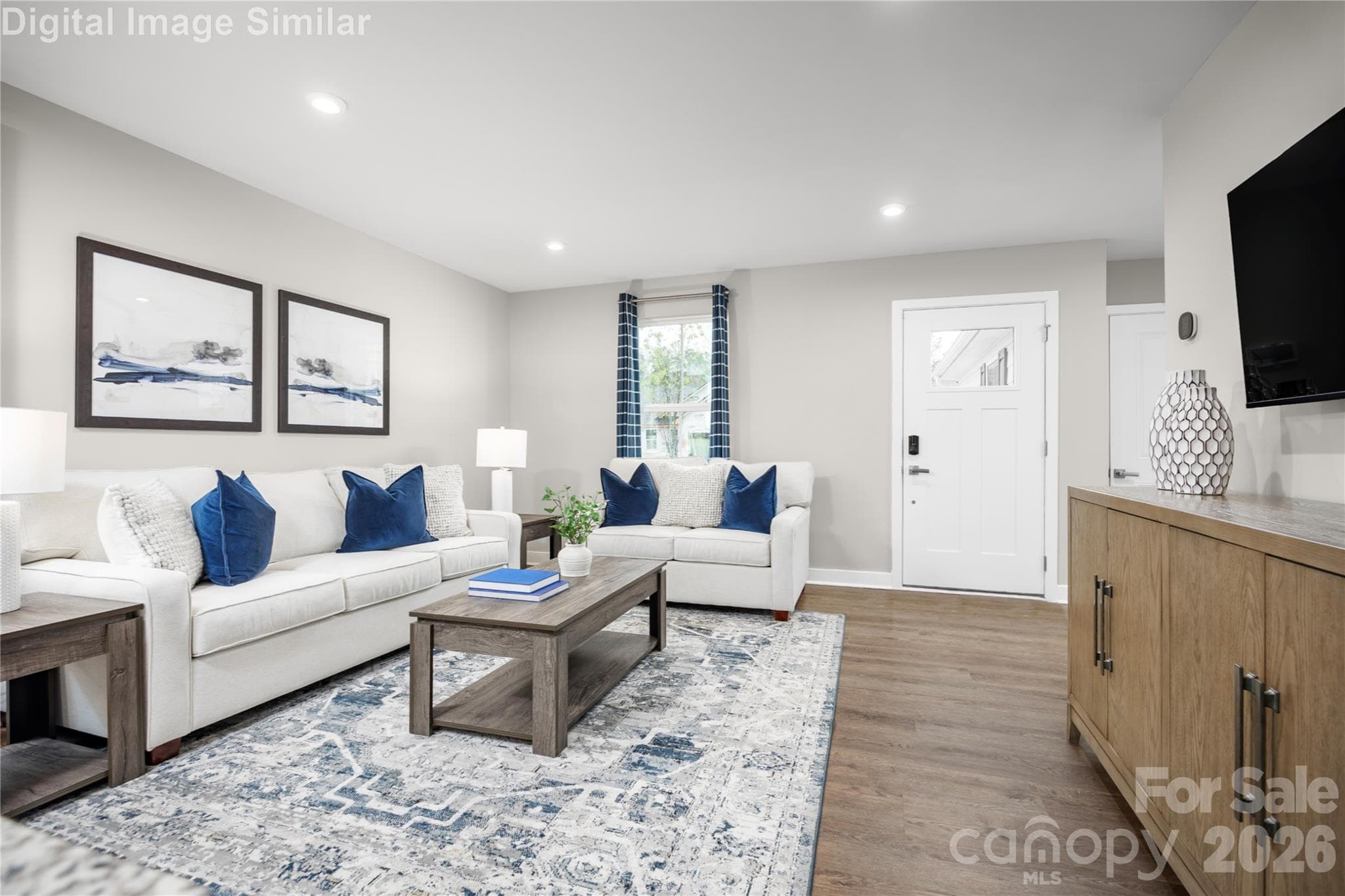 Step through the front entrance and you’re immediately greeted by a sense of openness and warmth. This great room is more than just a living space—it’s a statement. - 208 Linwood Estates Drive, Lexington