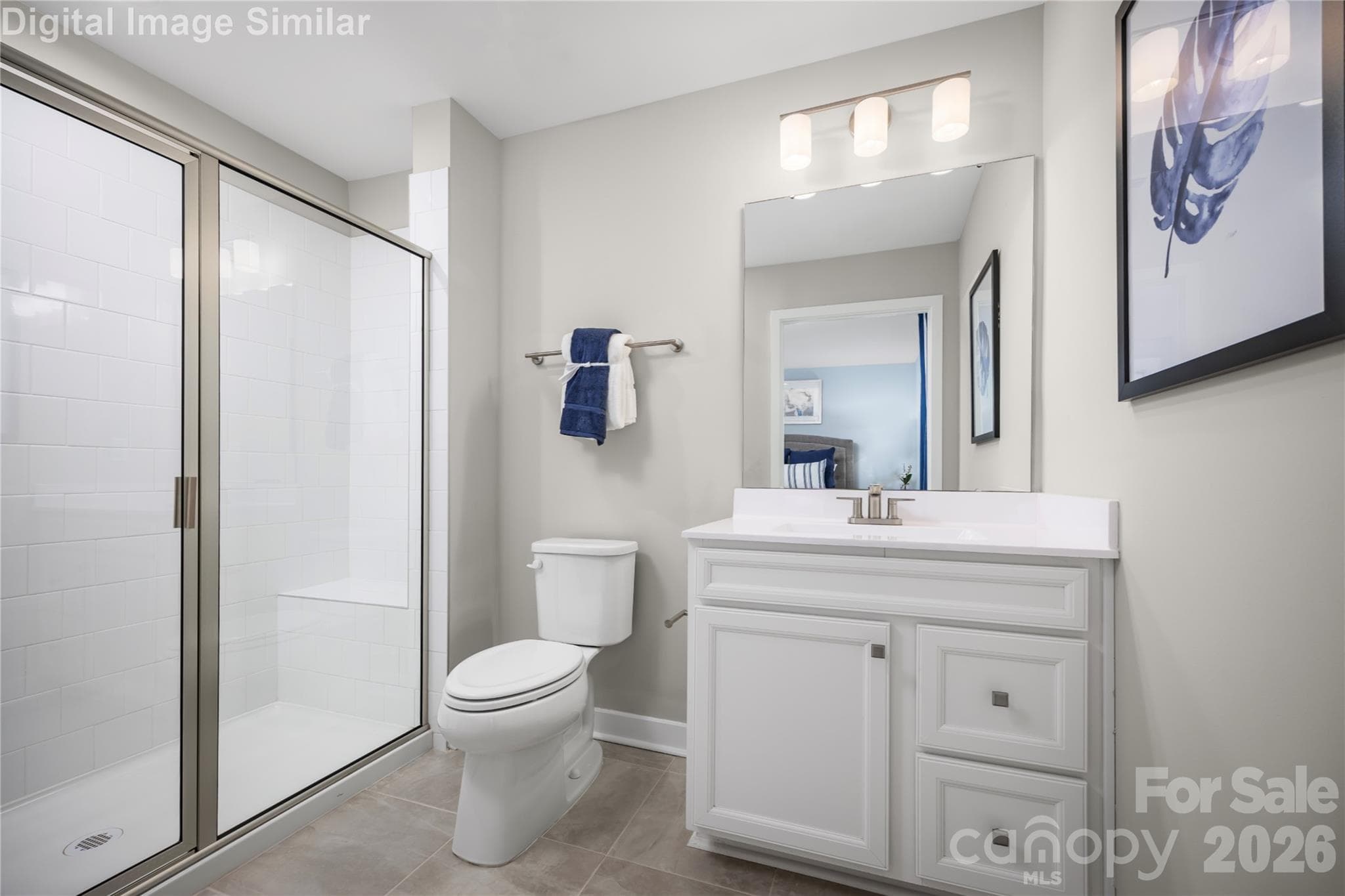 Clean lines and smart design create a space that's both spacious and soothing. The standout feature - a framed shower door that adds a touch of sophistication while keeping the space feeling open and airy. - 208 Linwood Estates Drive, Lexington