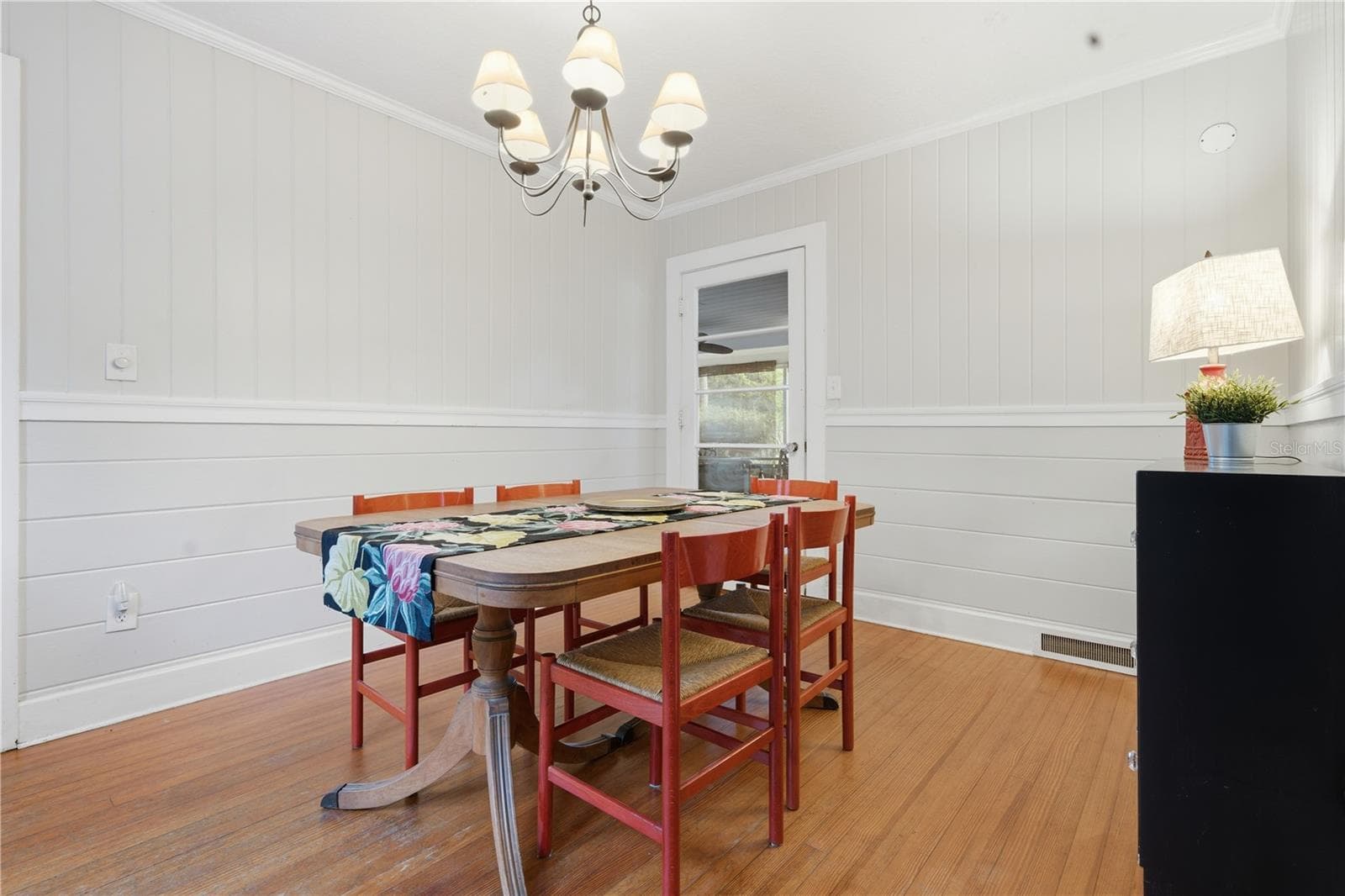 Open dining space with natural light and easy flow to the living areas. - 411 W 48TH ST, BRADENTON